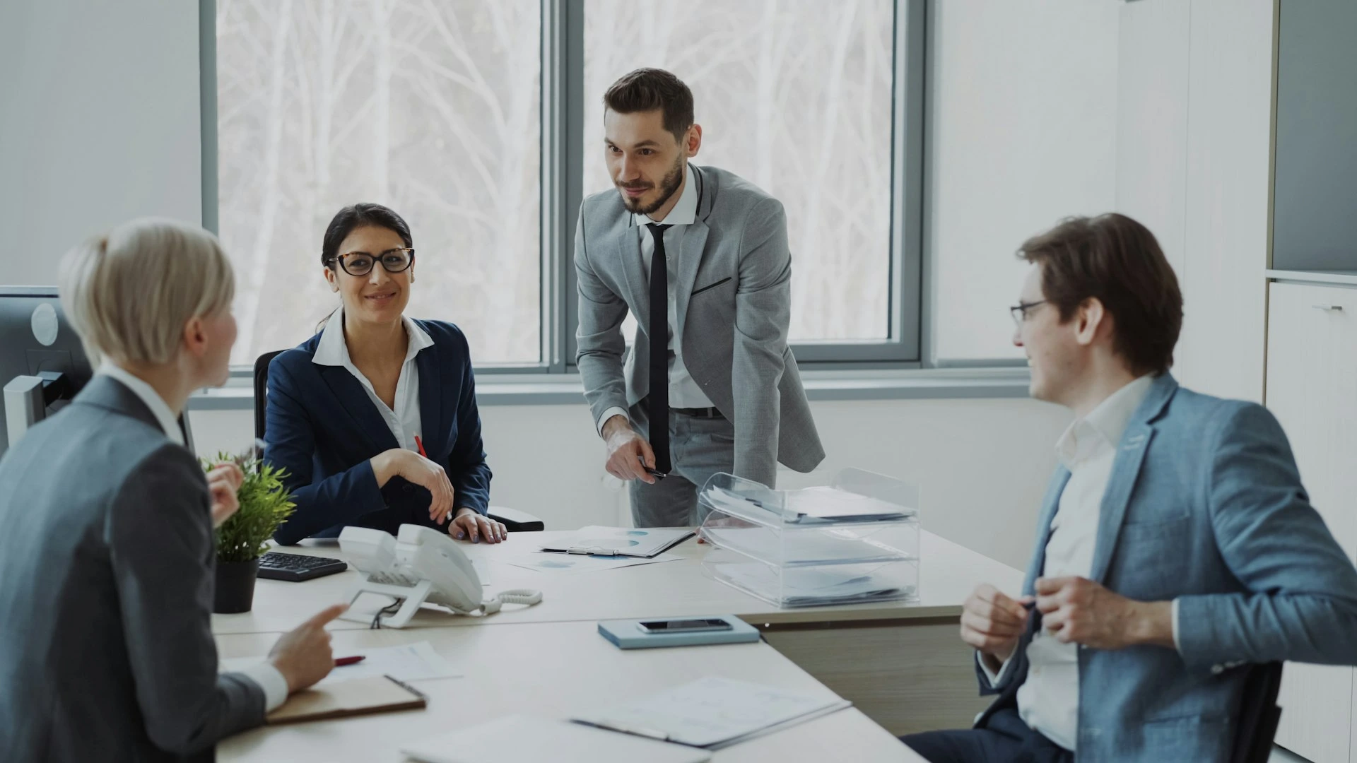 Business professionals collaborating around a conference table